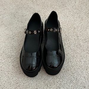 Platform black Mary Janes faux crocodile print